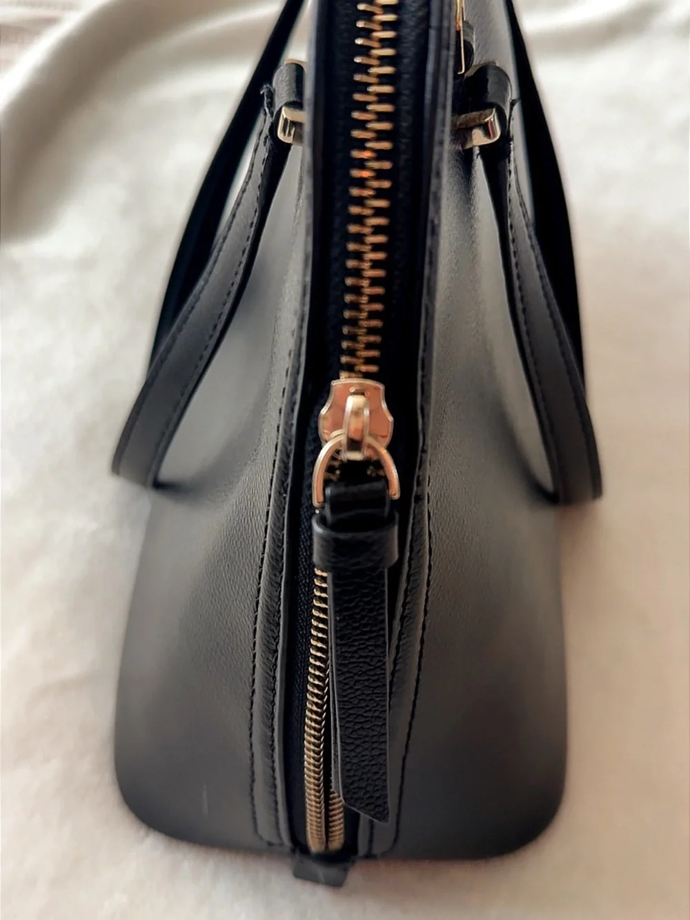 kate spade black leather dome tote with gold-tone accents